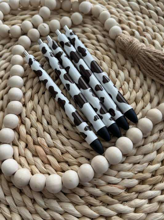 CLASSIC WHITE AND BROWN COW PRINT PENS